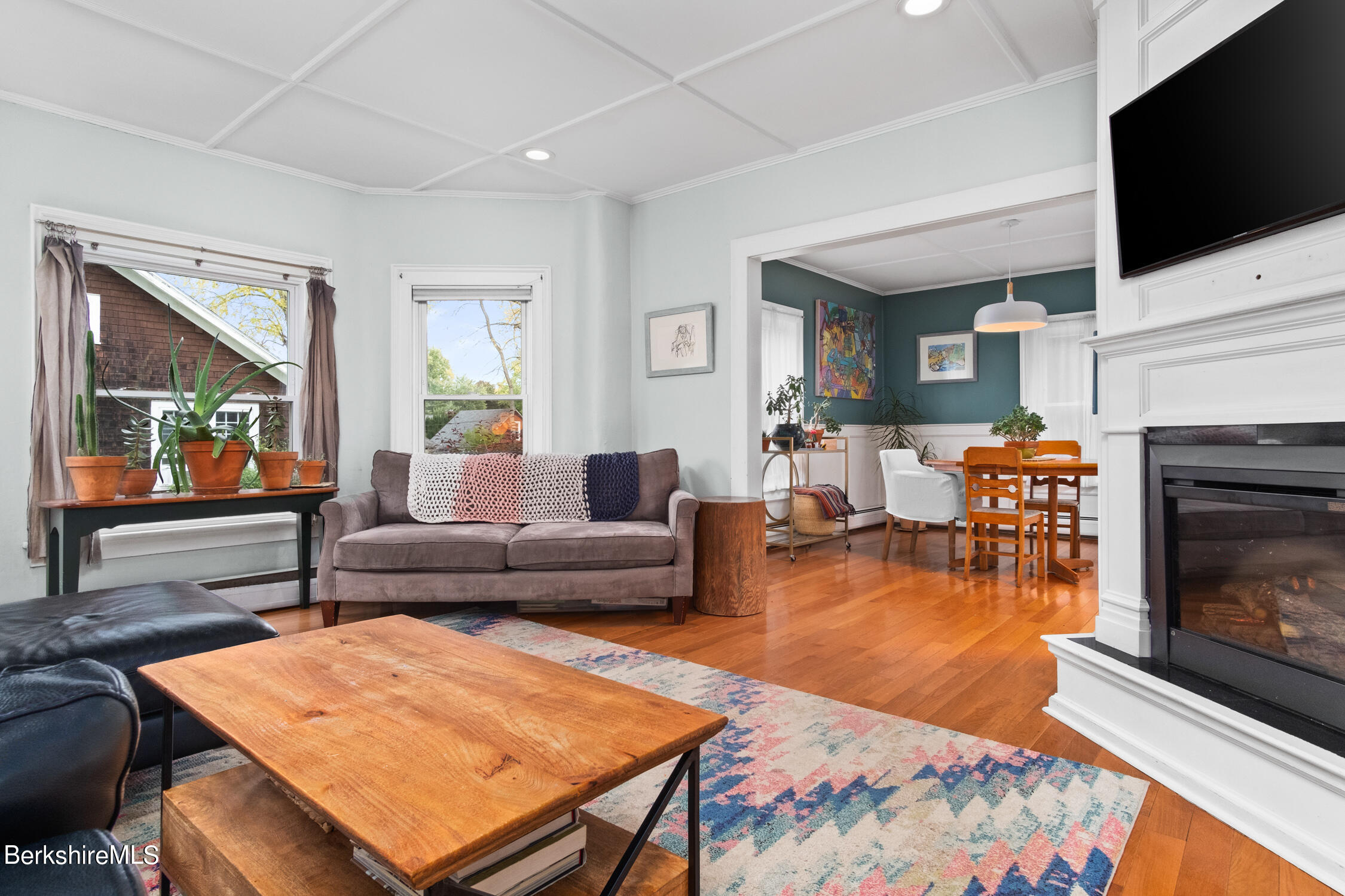 70 Notch Road North Adams, MA 01247 - Photo 11 of 22 a living room with furniture a flat screen tv and a fireplace