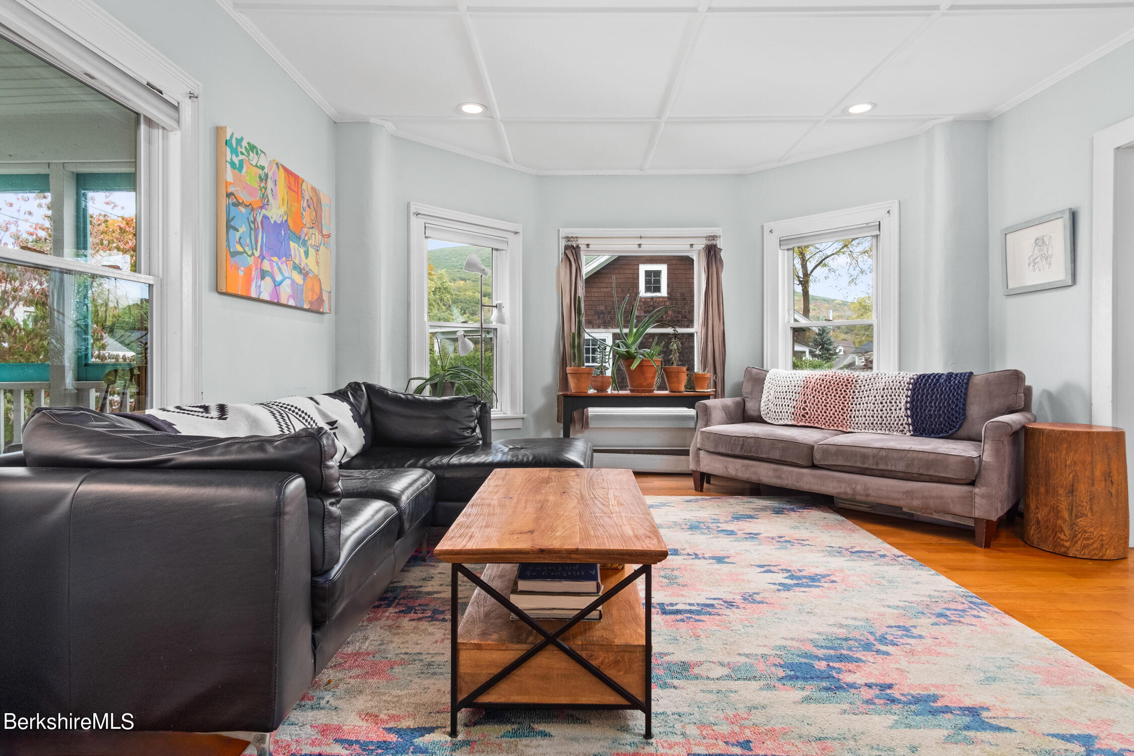 70 Notch Road North Adams, MA 01247 - Photo 12 of 22 a living room with furniture a rug and a flat screen tv
