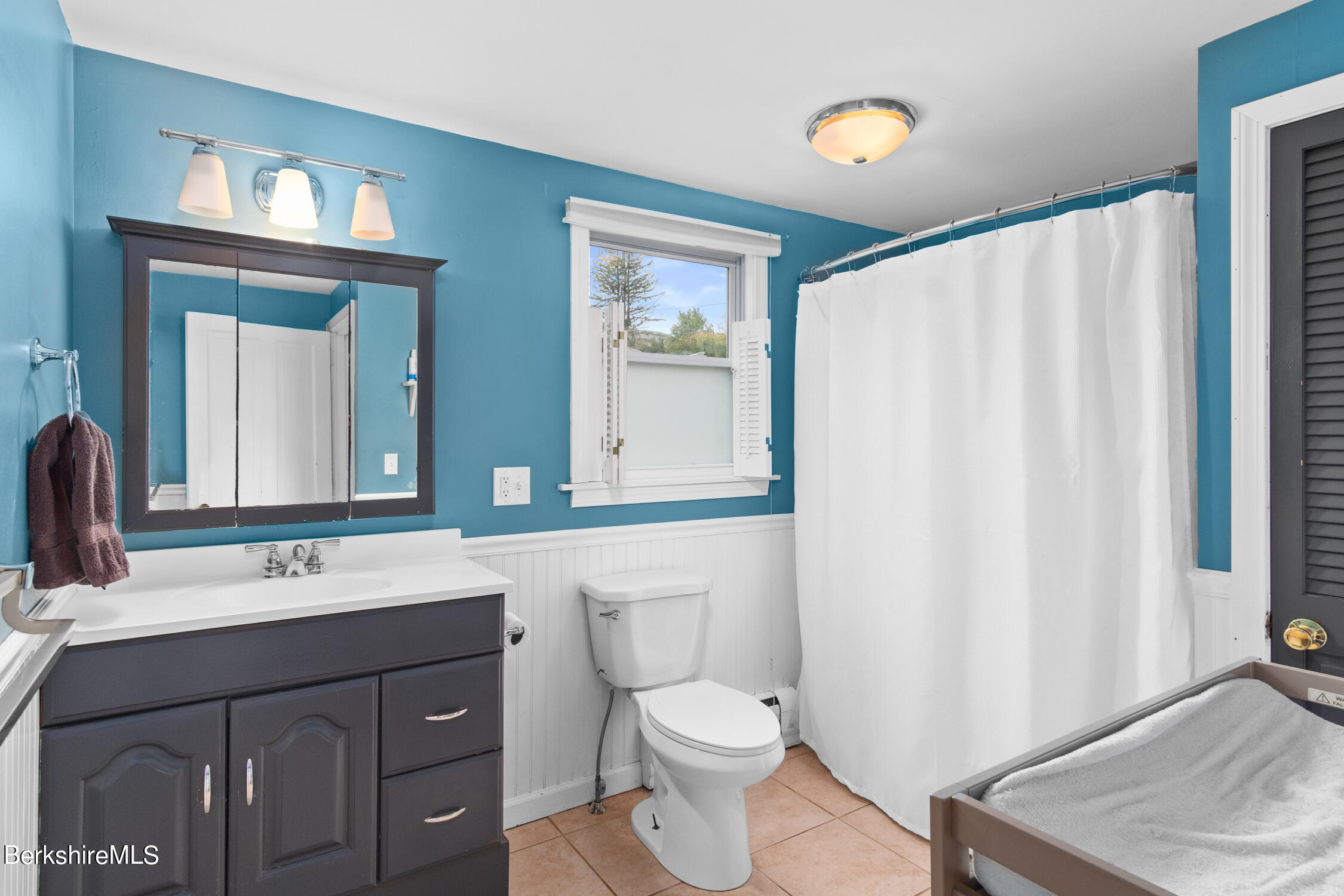 70 Notch Road North Adams, MA 01247 - Photo 17 of 22 a bathroom with a sink vanity and a mirror