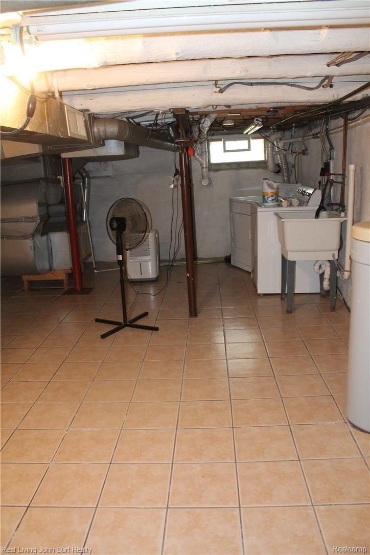 1968 Mitchell Lake Road Attica, MI 48412 - Photo 64 of 66 Laundry in basement.jpg
