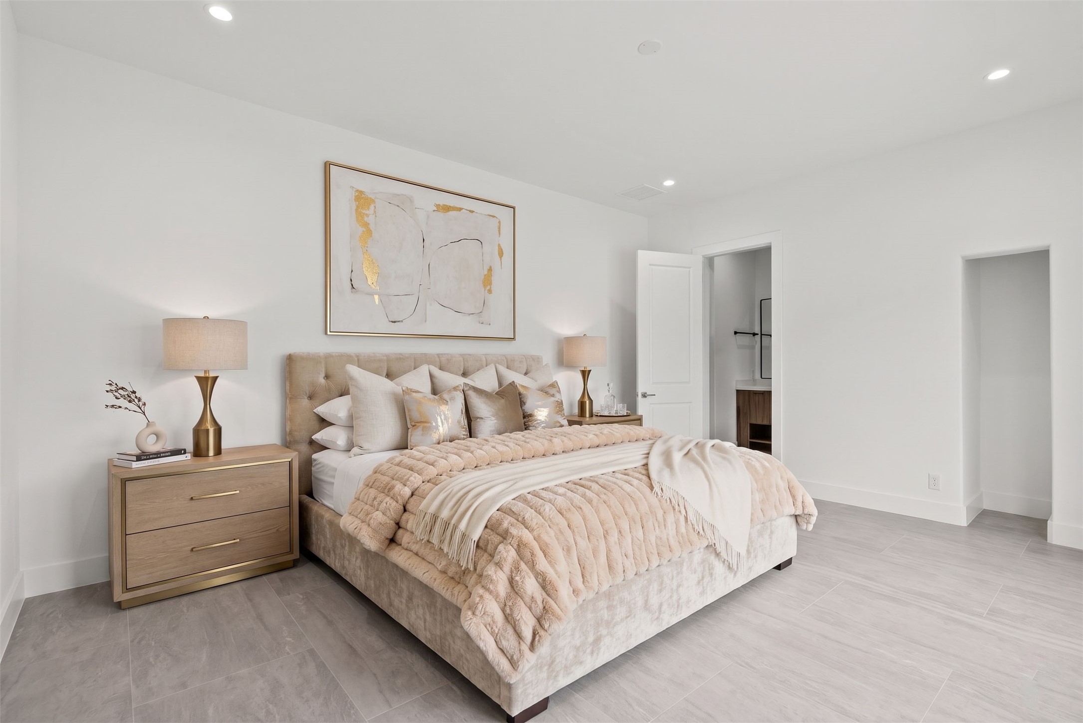7627 Scott Avenue Manvel, TX 77578 - Photo 33 of 50 The spacious 20 x 13.5, guest suite bedroom, showcases the home's modern elegance.