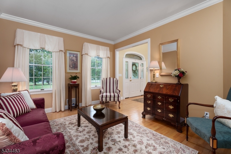 110 Orchard Road Skillman, NJ 08558 - Photo 6 of 43 a living room with furniture and a wooden floor
