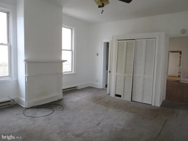 an empty room with windows