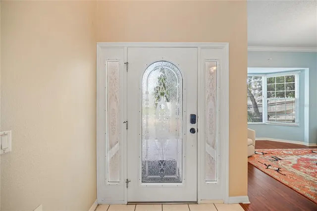 a view of a kitchen area with wooden floor