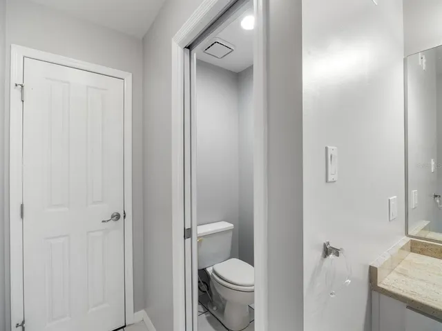 a bathroom with a toilet and a sink