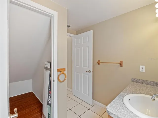a bathroom with a sink and a shower