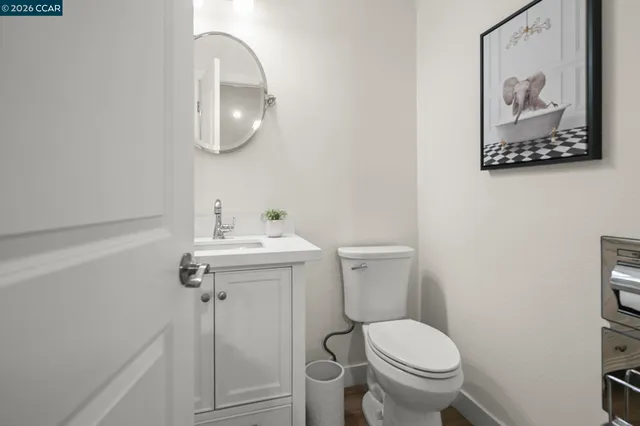 a picture of a bathroom with a shower