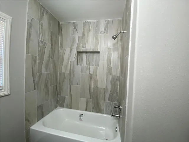 a bathroom with a bathtub