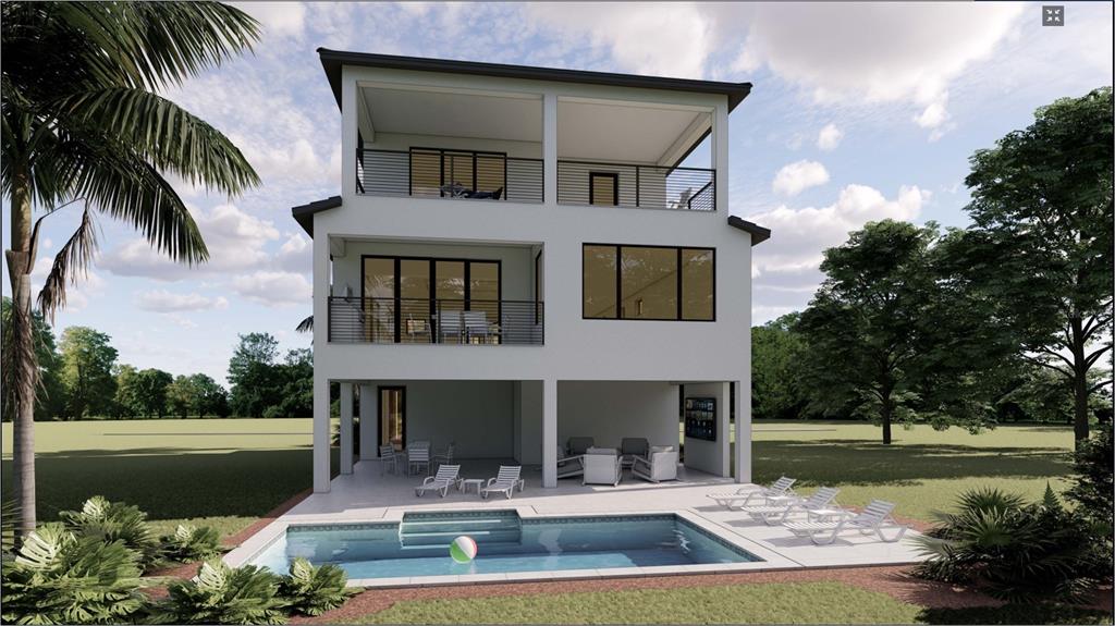 4903 Commonwealth Drive Sarasota, FL 34242 - Photo 5 of 24 a front view of a house with garden