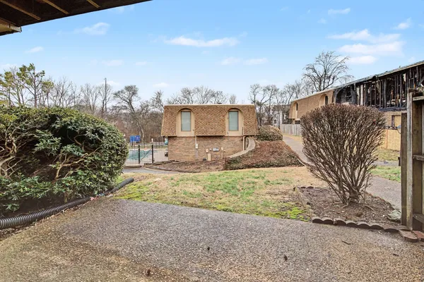 a view of swimming pool with a backyard