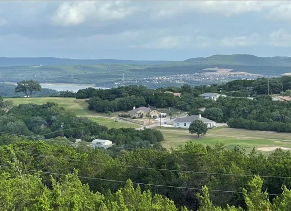 a view of a lake with a mountain in the background