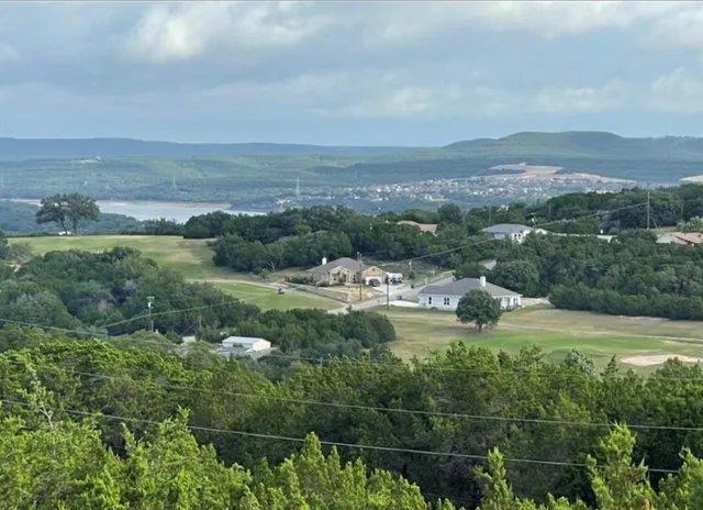 a view of a lake with a mountain in the background