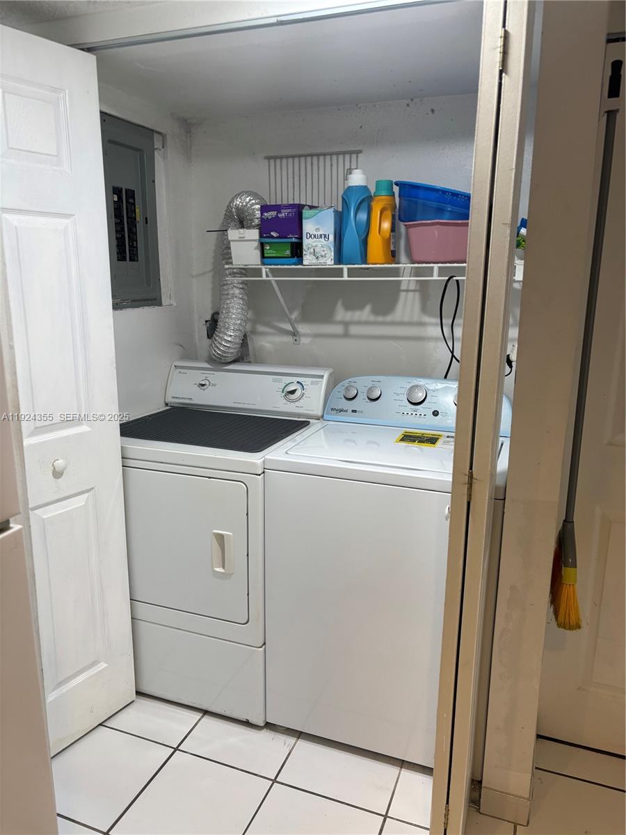 14250 Southwest 62nd Street, Unit 520 Miami, FL 33183 - Photo 18 of 39 a utility room with dryer and washer
