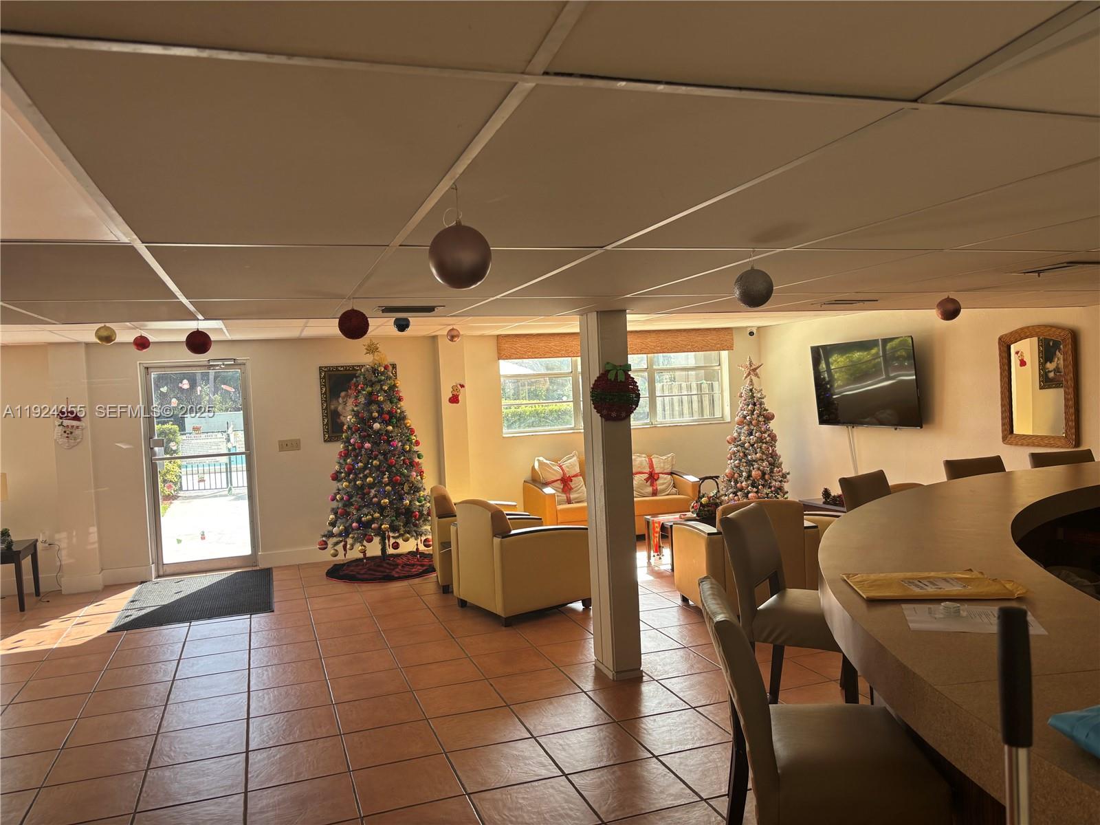 14250 Southwest 62nd Street, Unit 520 Miami, FL 33183 - Photo 33 of 39 a view of a livingroom with furniture and windows