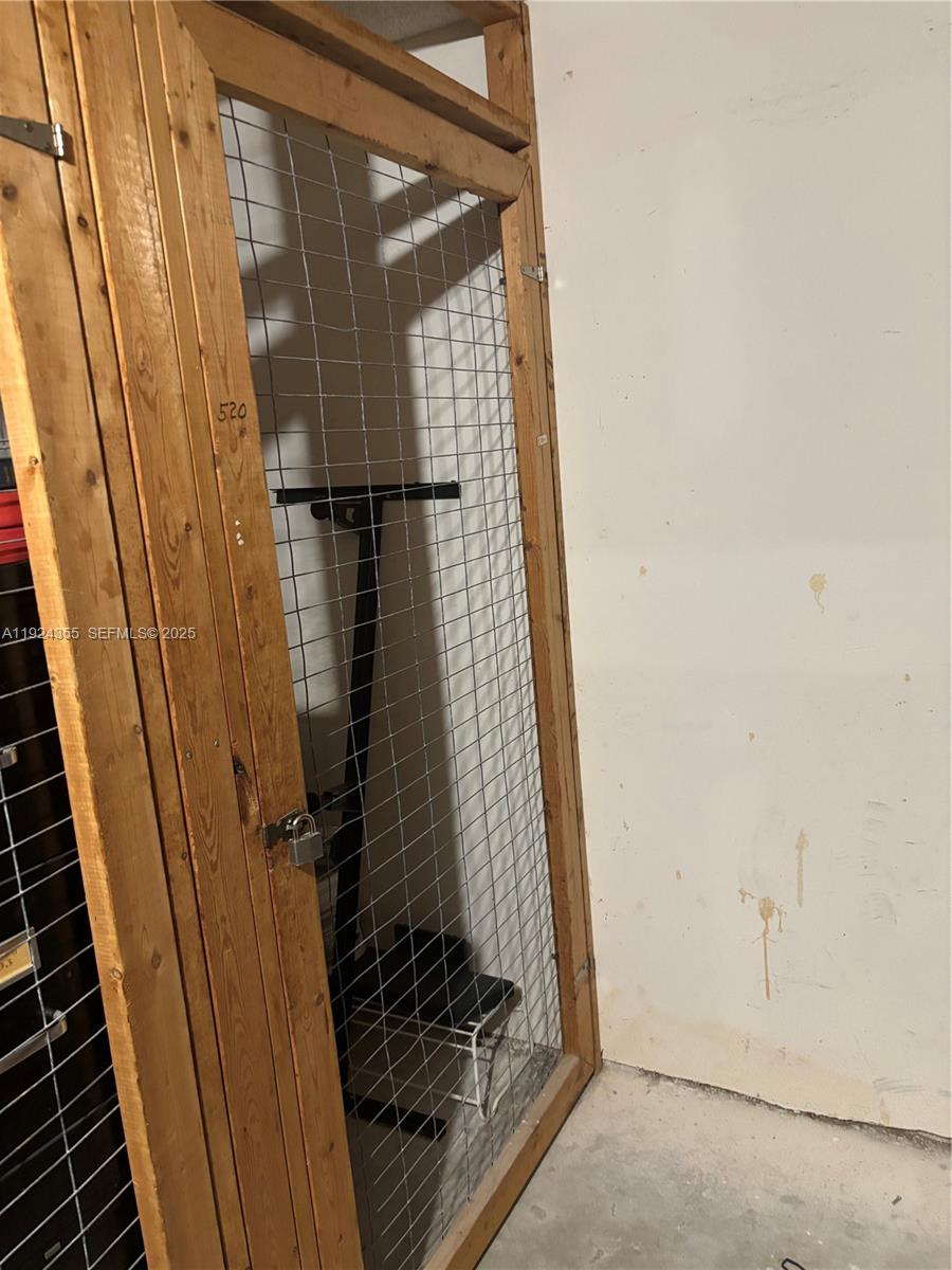 14250 Southwest 62nd Street, Unit 520 Miami, FL 33183 - Photo 37 of 39 a bathroom with a glass door shower