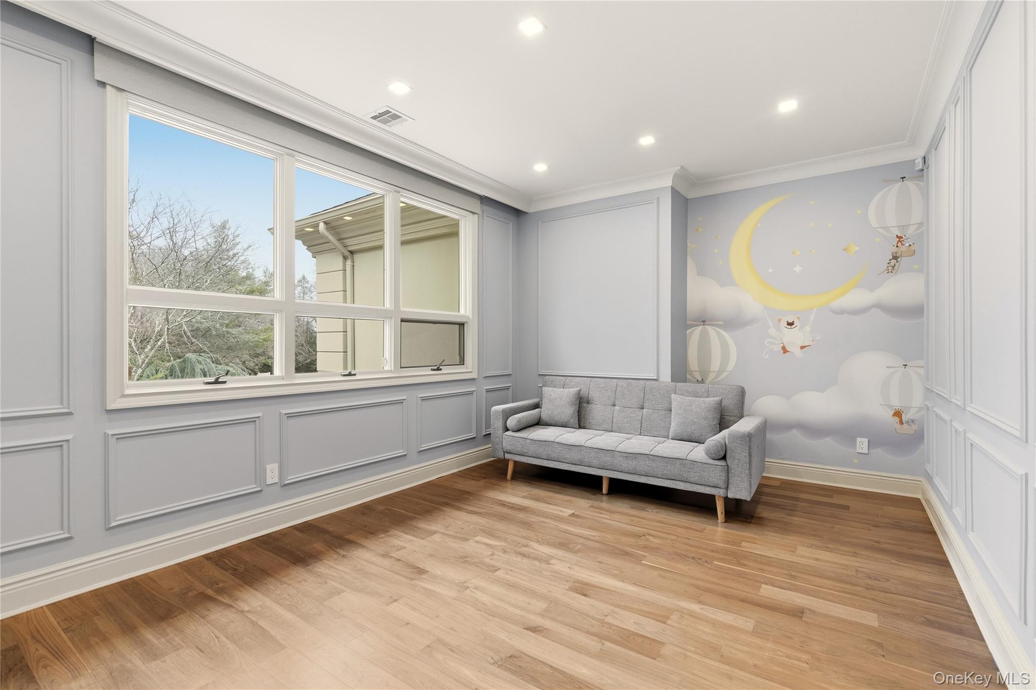 55 Coves Run Syosset, NY 11791 - Photo 33 of 50 a living room with furniture and a window