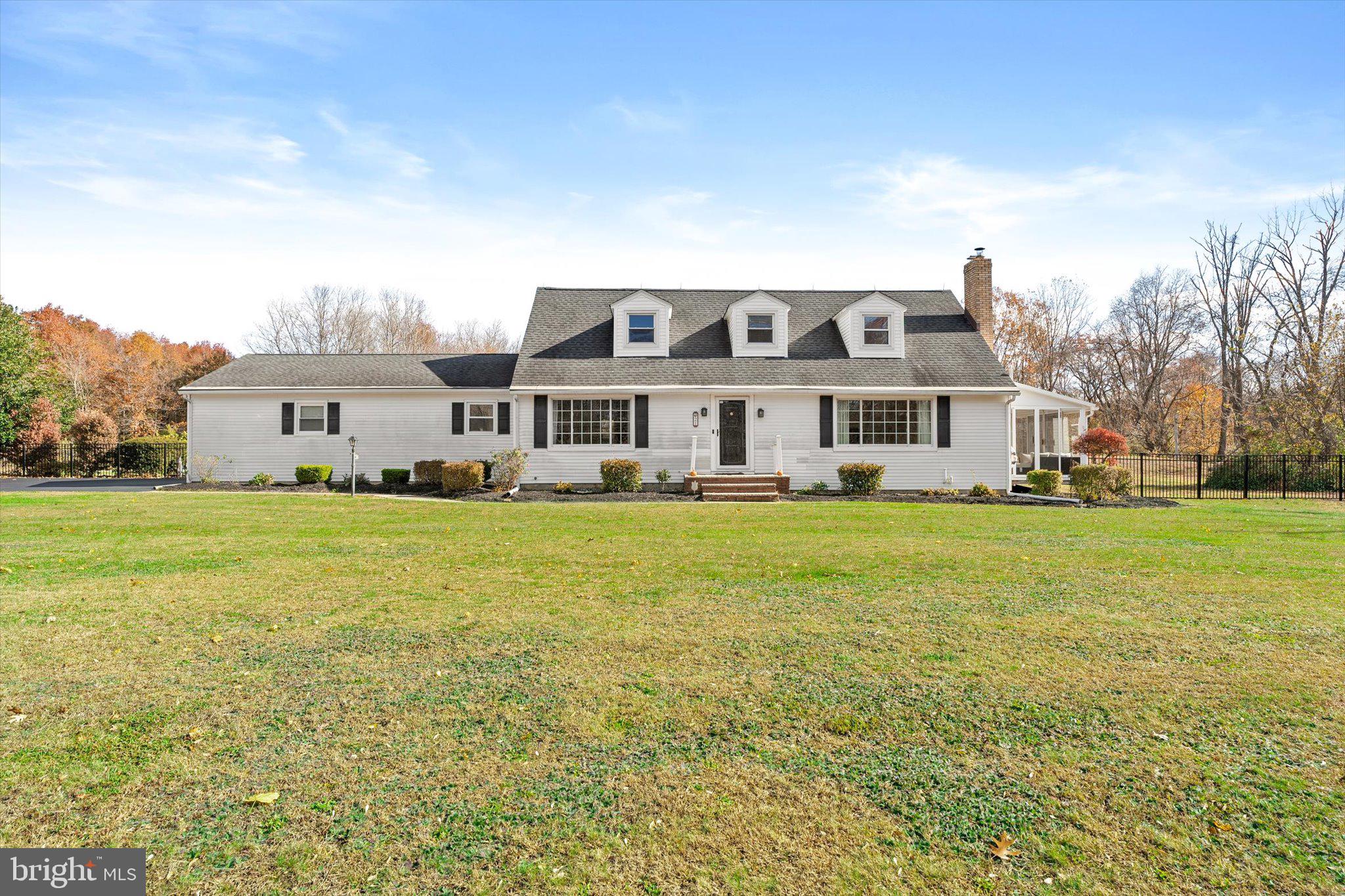 a front view of a building with garden