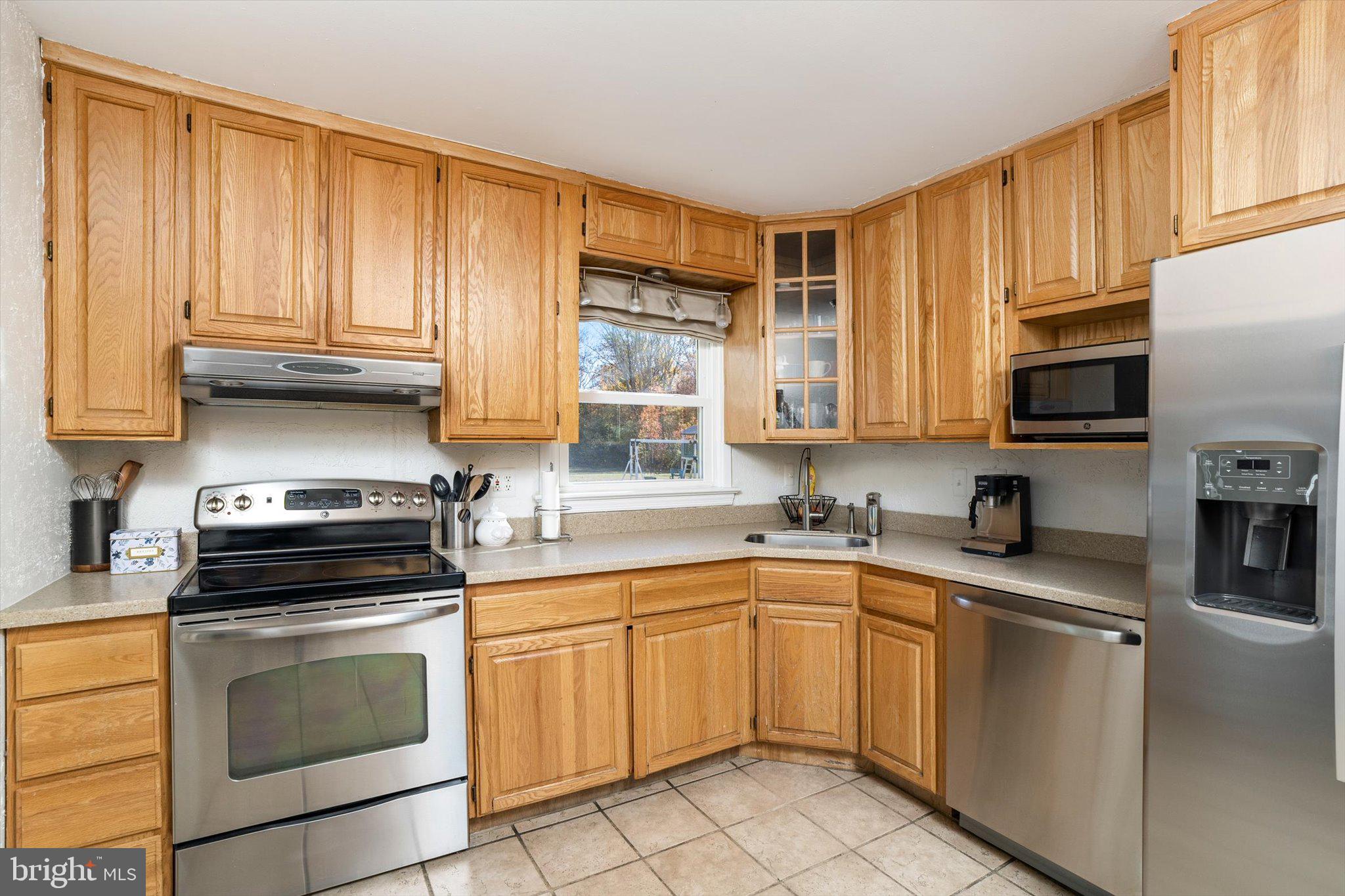 21 Holmes Mill Road Cream Ridge, NJ 08514 - Photo 13 of 37 a kitchen with granite countertop a sink stainless steel appliances and cabinets