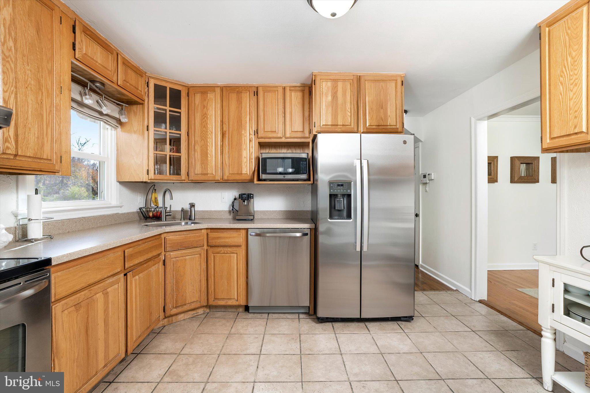 21 Holmes Mill Road Cream Ridge, NJ 08514 - Photo 15 of 37 a kitchen with a refrigerator sink and cabinets