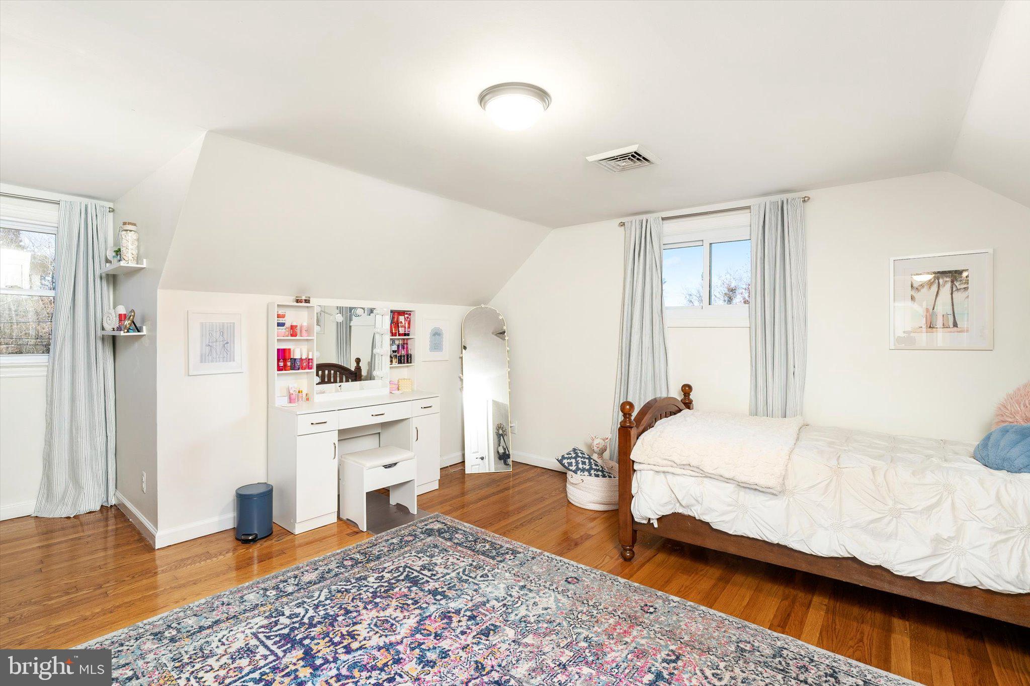 21 Holmes Mill Road Cream Ridge, NJ 08514 - Photo 22 of 37 a bedroom with a bed and a cabinets
