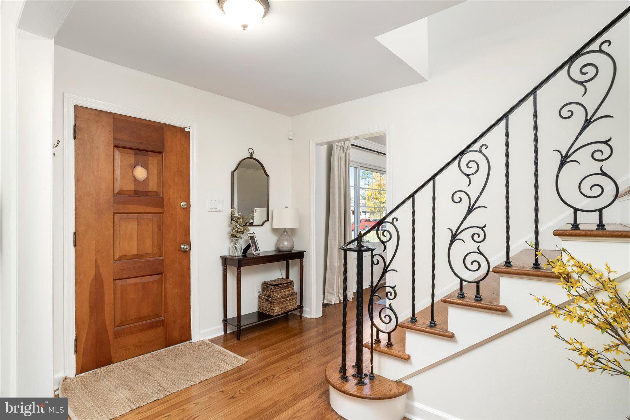 21 Holmes Mill Road Cream Ridge, NJ 08514 - Photo 5 of 37 a view of entryway kitchen and hall with wooden floor