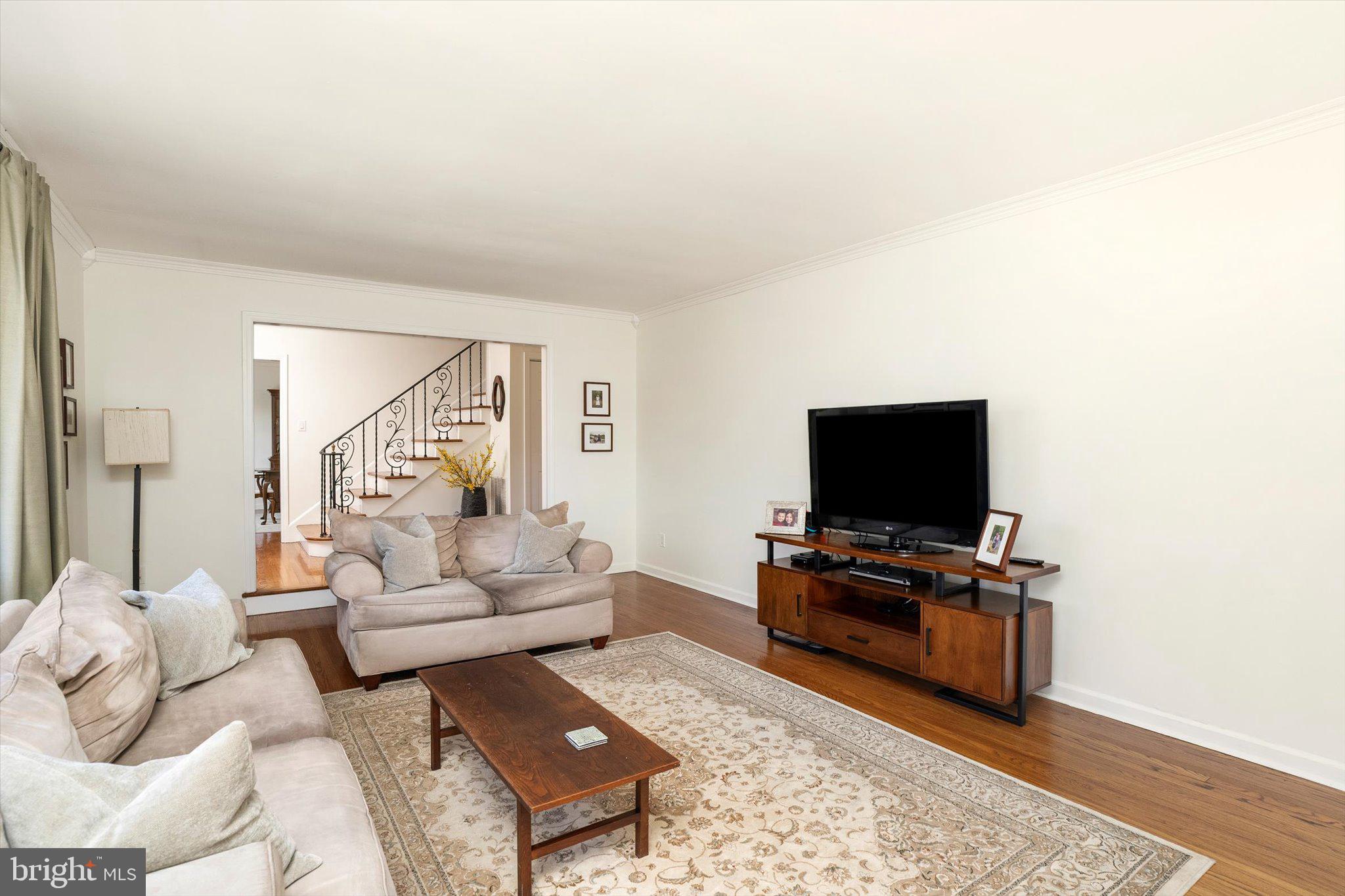21 Holmes Mill Road Cream Ridge, NJ 08514 - Photo 8 of 37 a living room with furniture and a flat screen tv