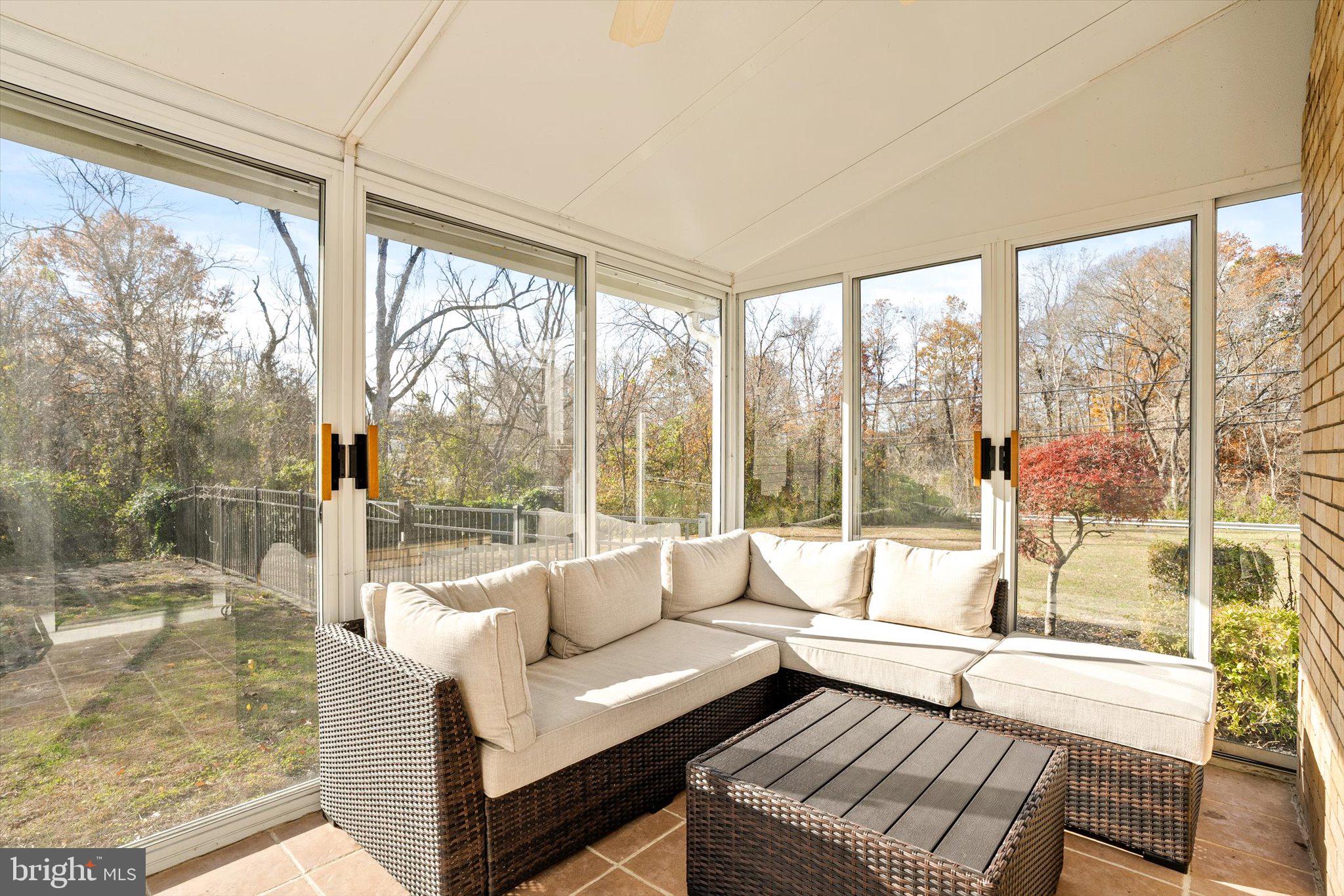21 Holmes Mill Road Cream Ridge, NJ 08514 - Photo 9 of 37 a living room with furniture and a floor to ceiling window
