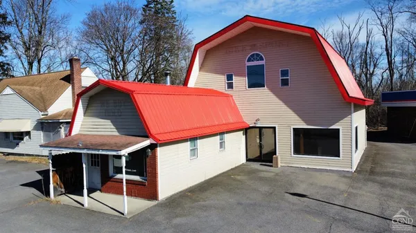 a front view of a house with a garage