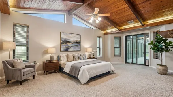 a view of a swimming pool with a patio