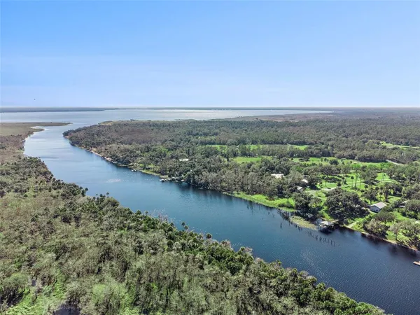 a workspace with wooden floor and a bathroom