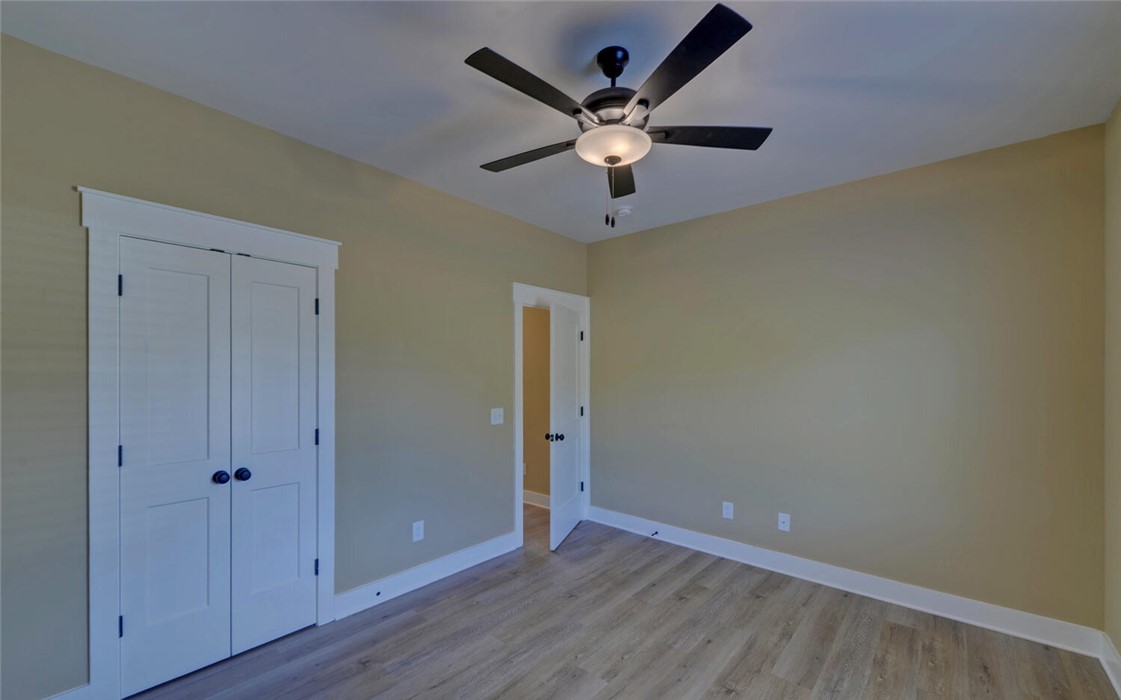 111 Topher Street Hartwell, GA 30643 - Photo 24 of 38 An inviting room features light-toned flooring and a convenient closet.