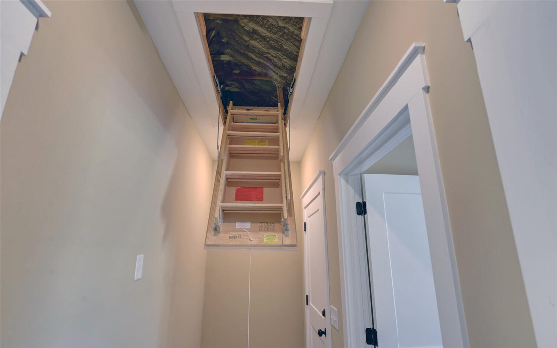 111 Topher Street Hartwell, GA 30643 - Photo 31 of 38 Accessory space awaits discovery through a convenient attic entrance.