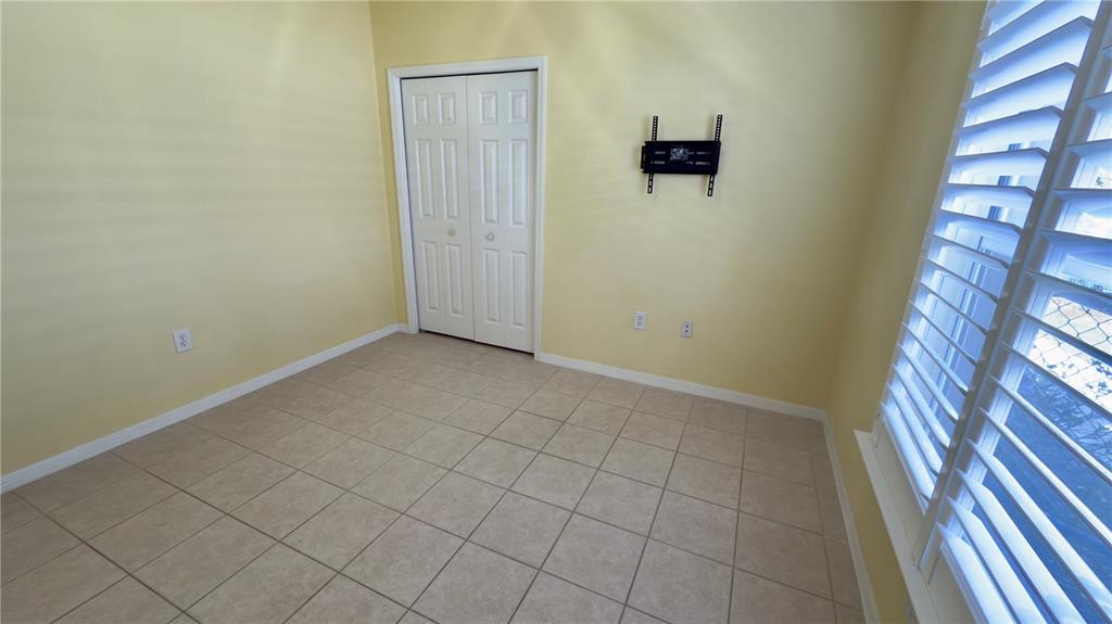 2049 Larissa Court Trinity, FL 34655 - Photo 25 of 61 an empty room with windows