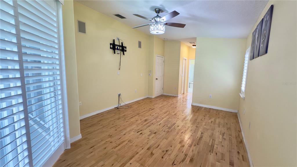 2049 Larissa Court Trinity, FL 34655 - Photo 34 of 61 wooden floor in an empty room with a window