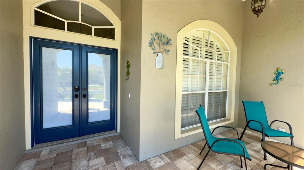 2049 Larissa Court Trinity, FL 34655 - Photo 9 of 61 a view of a chair and table in the balcony