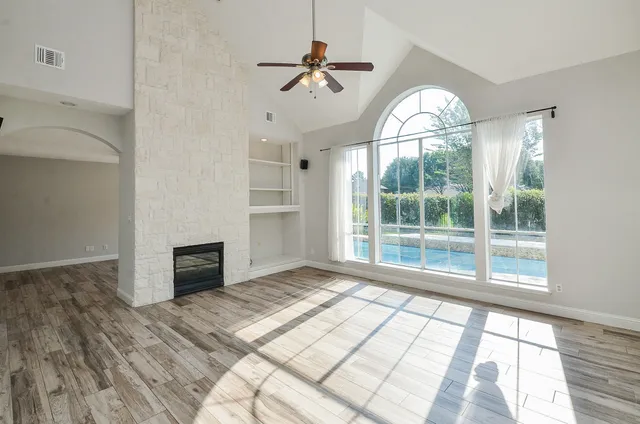 a kitchen with stainless steel appliances granite countertop a stove and a sink