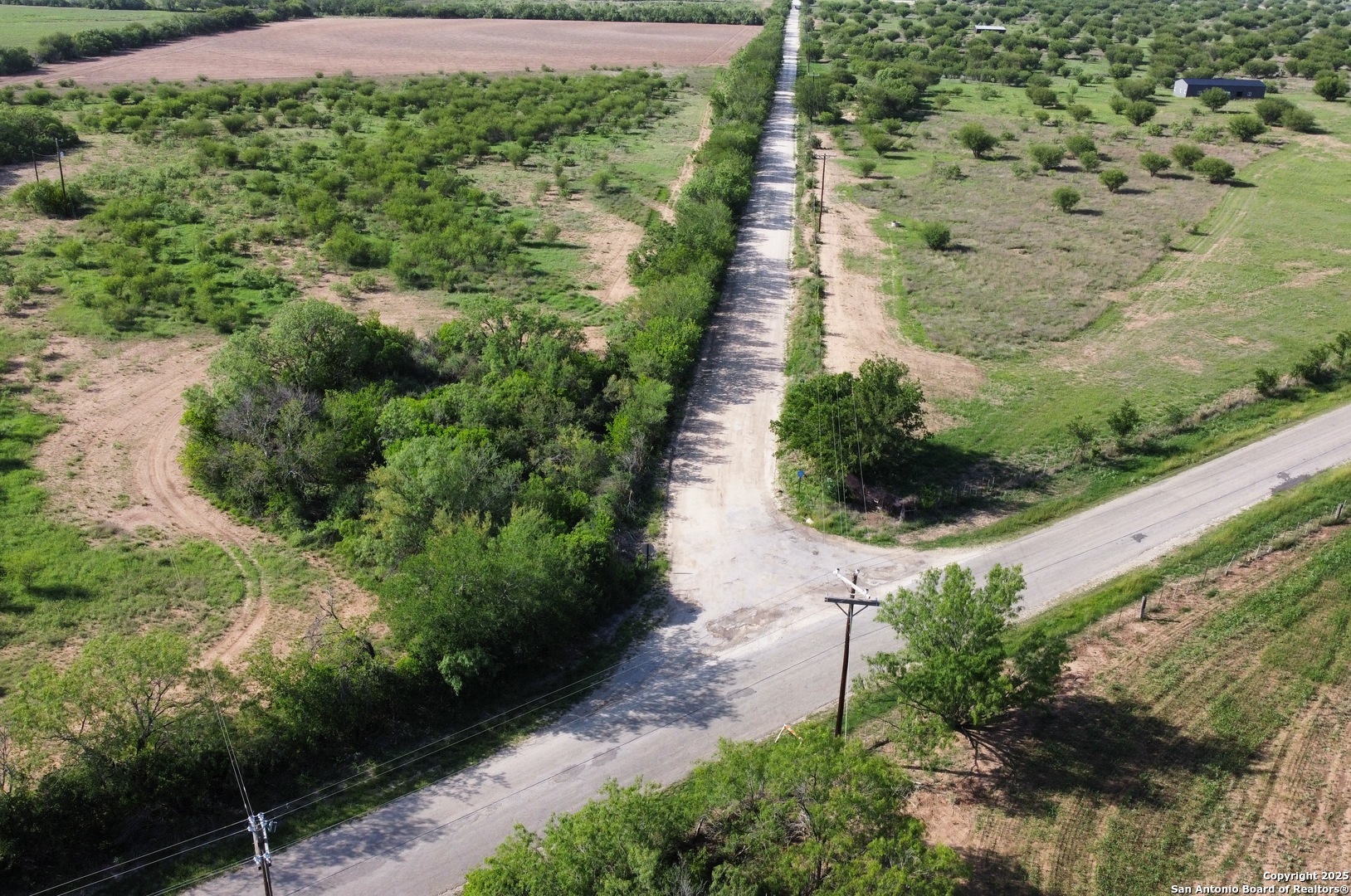 9 County Road 305 Knippa, TX 78870 - Photo 9 of 11 a view of a garden with pathway