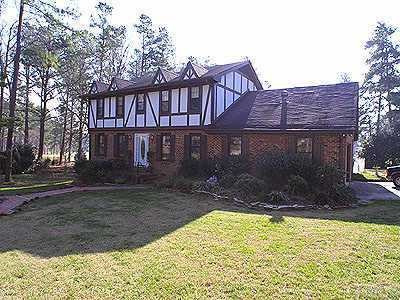 6702 Foxfire Place Raleigh, NC 27615 - Photo 1 of 1 front view of a house with a yard