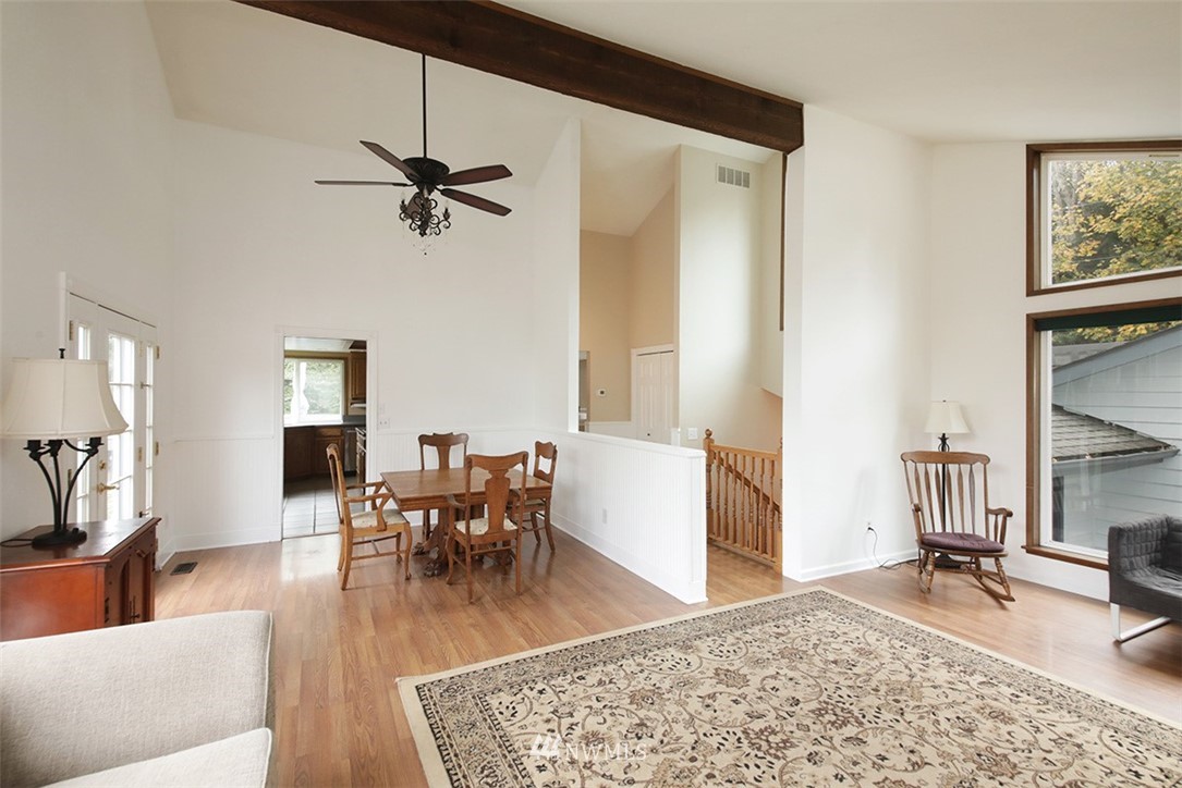 6793 Sills Road Clinton, WA 98236 - Photo 14 of 37 a living room with furniture and wooden floor