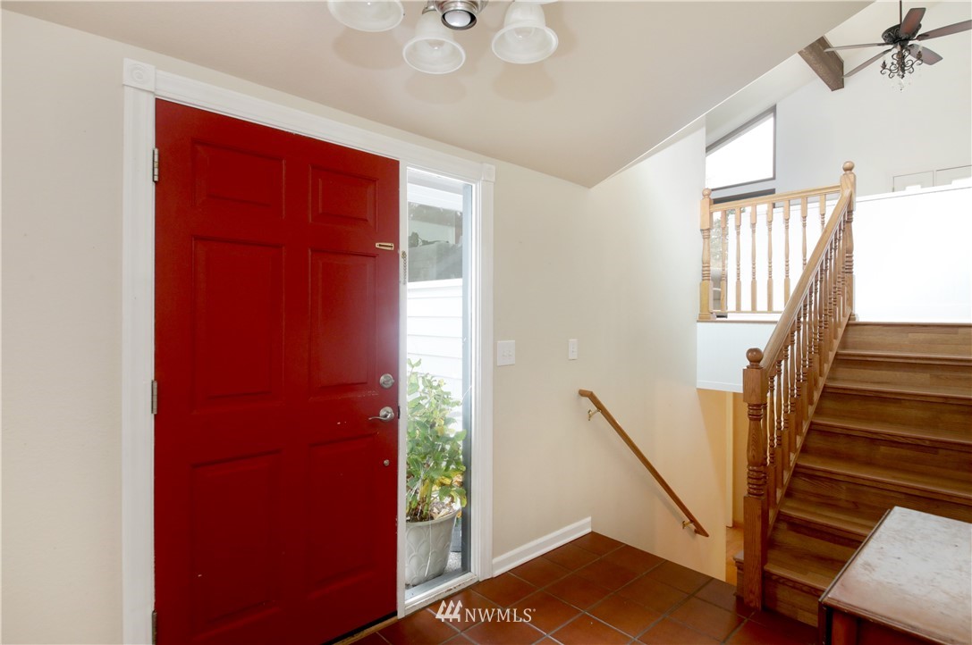 6793 Sills Road Clinton, WA 98236 - Photo 16 of 37 a view of an entryway with staircase