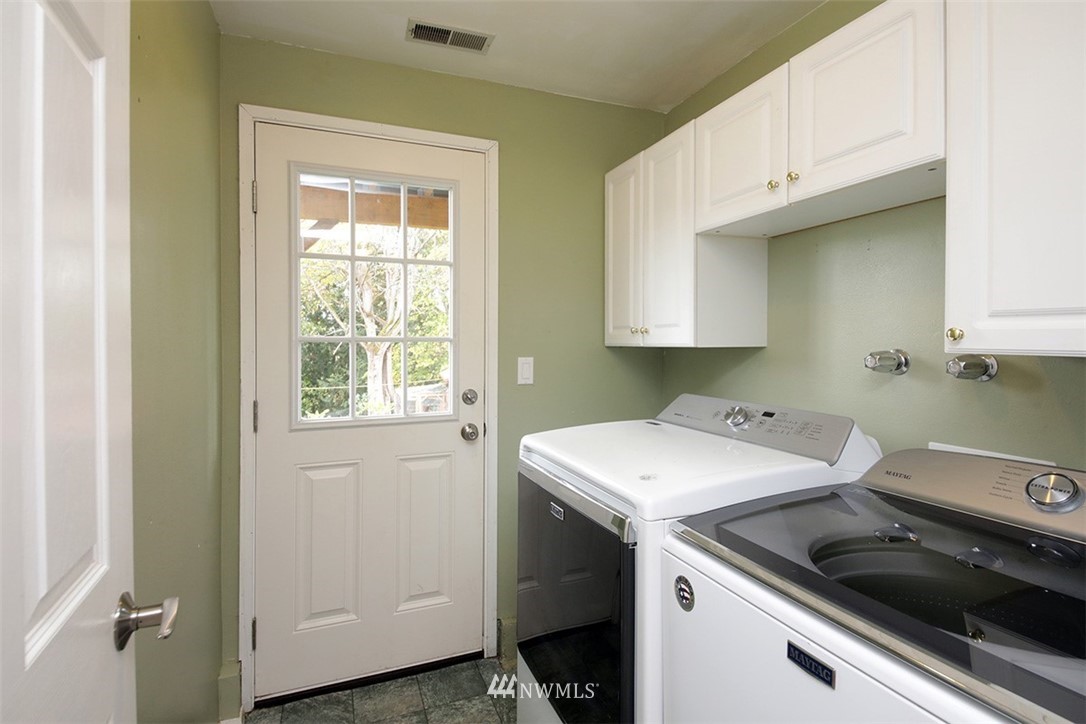 6793 Sills Road Clinton, WA 98236 - Photo 21 of 37 a utility room with dryer and washer