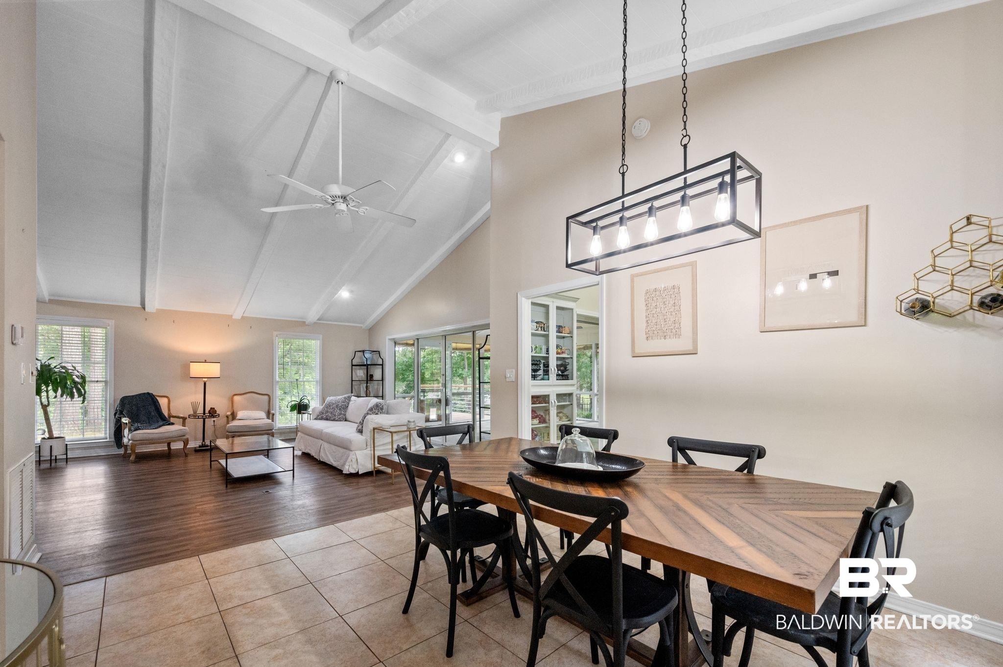 110 Ferncliff Circle Daphne, AL 36526 - Photo 6 of 40 Dining space with beam ceiling, plenty of natural light, high vaulted ceiling, ceiling fan, and baseboards
