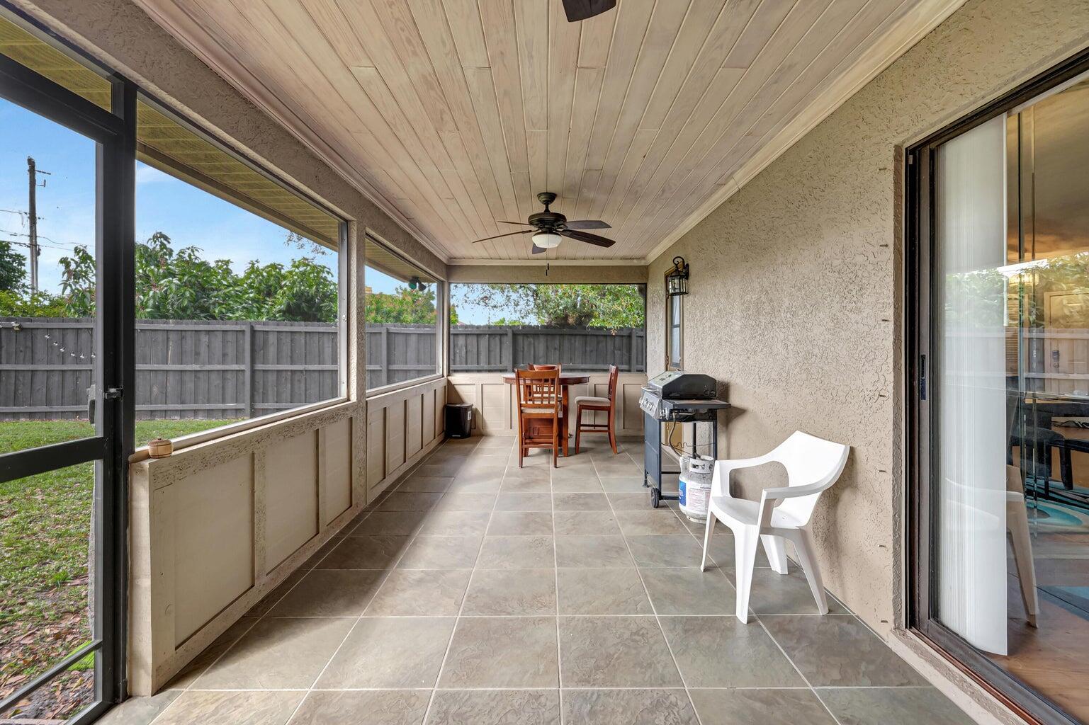 284 Southwest N Quick Circle Port St. Lucie, FL 34953 - Photo 16 of 18 a room with furniture and a large window