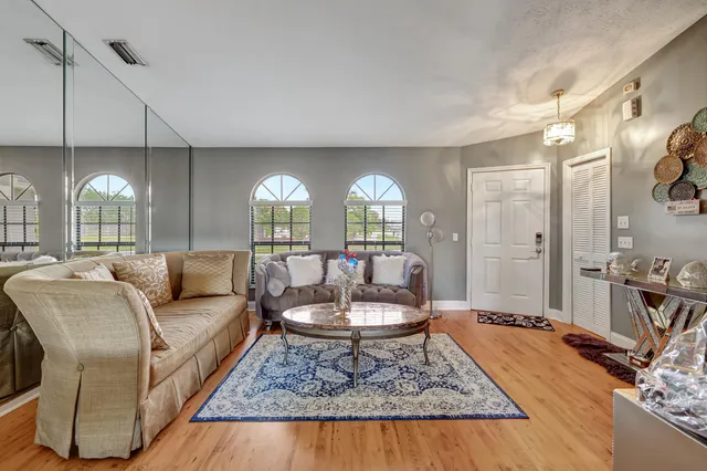 a living room with a couch and a table