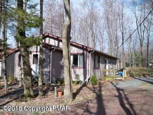 2112 Titania Road Tobyhanna, PA 18466 - Photo 1 of 1 a street view with tall buildings and cars