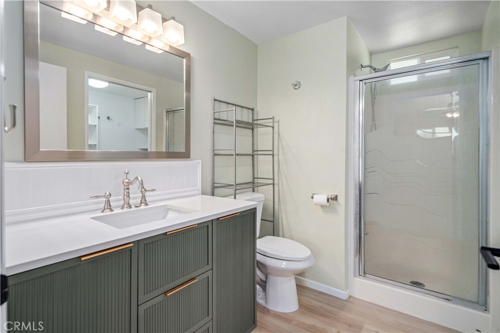 309 North Fairview Street Ridgecrest, CA 93555 - Photo 16 of 30 a bathroom with a sink toilet and shower