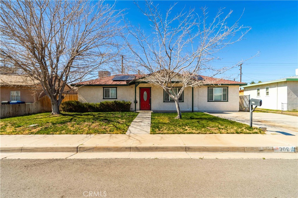 309 North Fairview Street Ridgecrest, CA 93555 - Photo 3 of 30 a view of a house with a yard and pathway