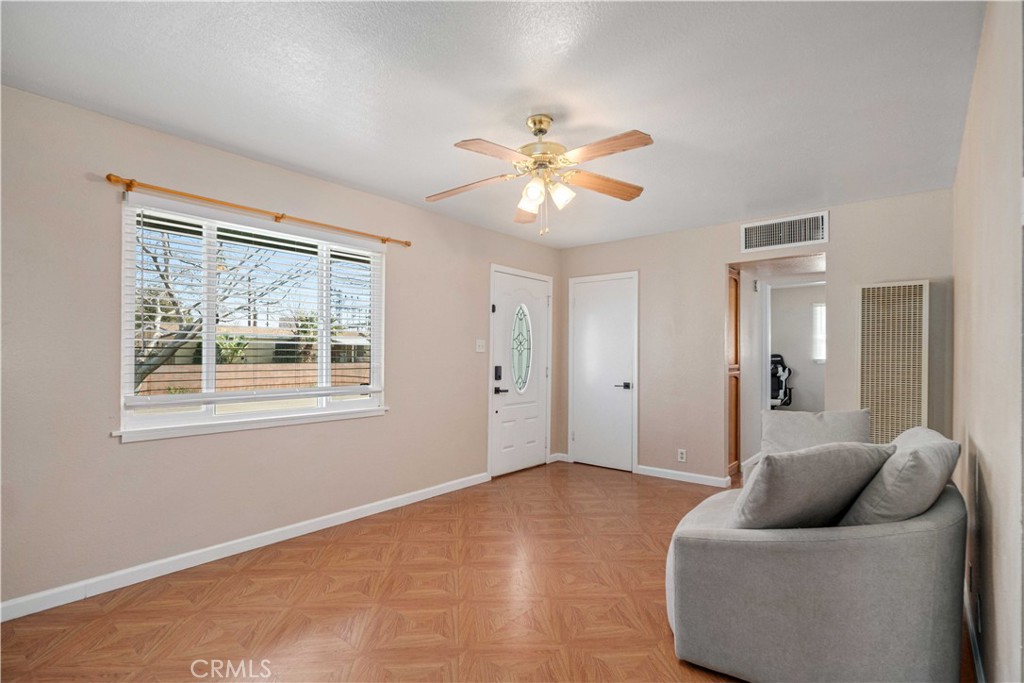 309 North Fairview Street Ridgecrest, CA 93555 - Photo 7 of 30 a living room with furniture and a window