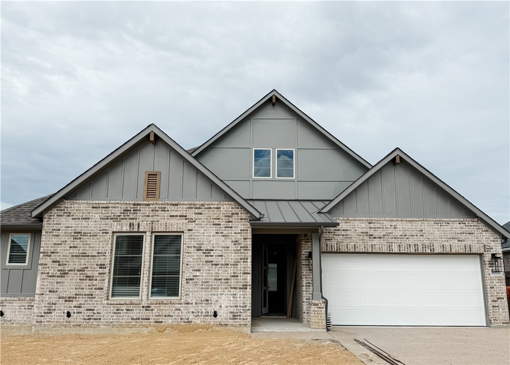 5008 Royal Arch Drive Bryan, TX 77802 - Photo 1 of 1 a front view of a house with garage