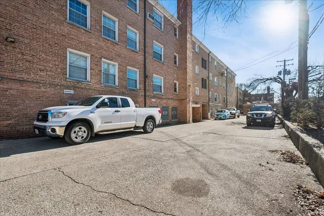 a view of a pathway both side of the house